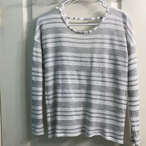 Gray and white long sleeve sweater, open back